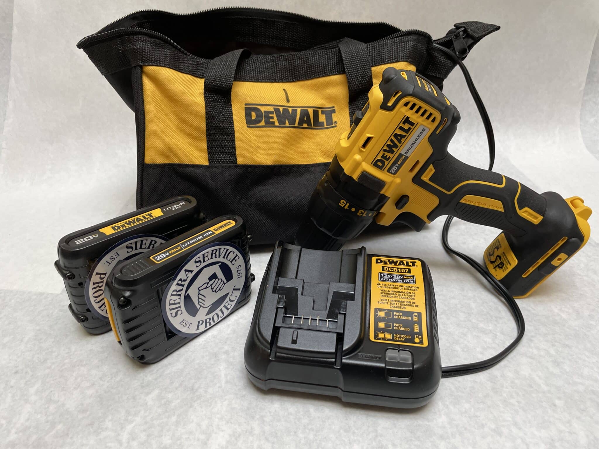 Tool library item: DeWalt cordless drill with battery packs.