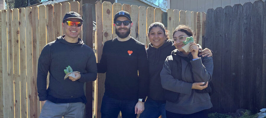 A team from Dropbox spent a Day of Service in North Sacramento building fences - Dropbox matches employee donations 1:1!